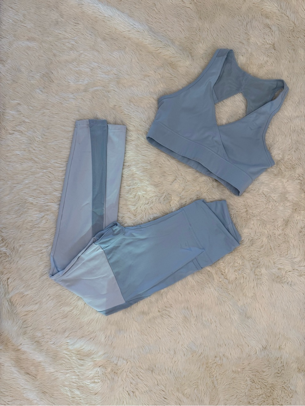 Nikki Blacketter x Gymshark
- Light Blue Leggings and Sports Bra Set